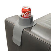 HIT PRODUCTS CouchCoaster armrest-cup-holder sits on sofa, keeping drinks secure.