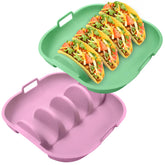 Holyenten taco holder 2-pack in pink and green keeps shells upright for easy filling.