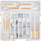 Homecor silverware organizer in collapsed drawer demonstrates compact, space-saving storage.