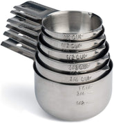 Hudson Essentials quarter-cup stainless steel measuring cup for precise dry ingredients.