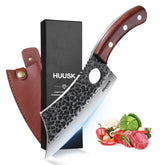 Huusk meat cleaver blade close-up highlighting sharp edge for precise cuts.