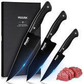 Huusk three-piece knife set blades closeup for precise slicing and edge readiness.