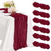 JALANCY Burgundy cheesecloth table runner close-up, soft crinkled texture ideal for rustic wedding tables.