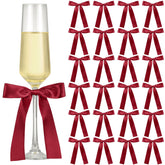 Jingmore burgundy wine glass bow enhances wedding table decor.