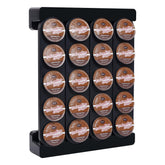 JMBTLUS wall-mounted pod holder on kitchen wall keeps K-Cups organized and accessible.