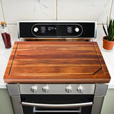 Jubilander acacia wood stove cover board adds extra counter space in the kitchen.