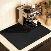 JuSiyley coffee mat under the coffee maker highlighting stain hiding and easy cleaning