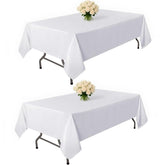 Kachanaa 2-pack white rectangle table cloth on a table for effortless cleanup.