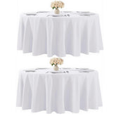 Kachanaa round white 90-inch tablecloth on a dining setup for elegant coverage