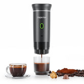 KEJECTOR portable espresso machine front view ready for outdoor coffee on a table