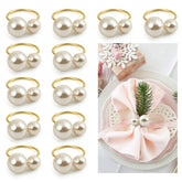 Kesote pearl napkin rings with gold finish on an elegant formal table