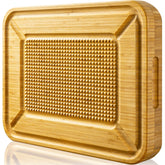 Kikcoin turkey carving board with pyramid spikes anchors meat for precise carving and reduced slipping.