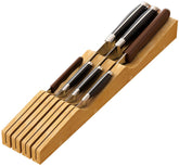 Kiplant knife drawer organizer in bamboo showing compact in-drawer storage for seven blades