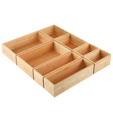 Kootek bamboo drawer organizer 8pc set shown in a tidy kitchen drawer for easy access.