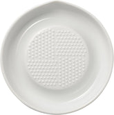 Kyocera ceramic grater with conical blades for fast ginger and garlic prep