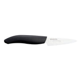 KYOCERA Revolution 3-inch paring knife with white blade for precise fruit prep and vegetable trimming.