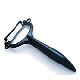 KYOCERA Y-Peeler blade closeup highlights a sharp ceramic edge for precise peeling