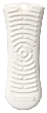 Le Creuset cool tool handle on a cookware handle, heat-resistant protection for safer transfers.
