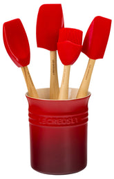 Le Creuset Craft Series stoneware crock with utensils for durable kitchen organization.