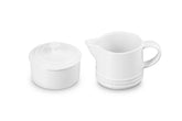 Le Creuset cream pitcher pour demonstrates drip-free, precise pouring for coffee.