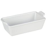 Le Creuset Heritage loaf pan showing even browning and vibrant glaze.