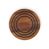 Le Creuset magnetic wooden trivet on acacia wood showing heat protection in kitchen settings
