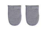 Le Creuset mini oven mitts Charbon grip for secure handling of hot cookware.