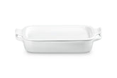 Le Creuset rectangular dish with platter lid in white for oven-to-table serving.