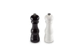 Le Creuset salt mill 8in black with ceramic grinder for even seasoning.