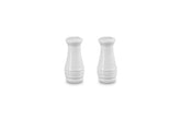 Le Creuset salt and pepper shaker set in white on display, ideal for everyday seasoning.