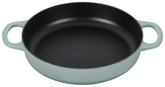Le Creuset Signature cast iron pan demonstrates even heat distribution for browning.