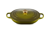 Le Creuset Signature oval casserole in olive ready for use with even heat distribution.