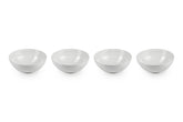 Le Creuset soup bowls 22oz white set of four on a table for entertaining meals.