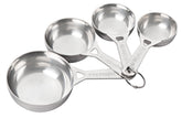Le Creuset stainless steel measuring cups set arranged for quick ingredient prep