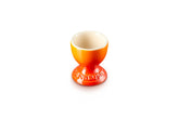 Le Creuset Egg Cup Flame front view, durable glaze for easy cleanup