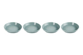Le Creuset stoneware pasta bowls in Sea Salt, four-piece set ideal for pasta dinners.