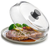 Le'raze 10-inch glass microwave splatter cover over a plate for mess-free reheating.