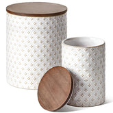 LE TAUCI ceramic containers set in embossed white glaze for stylish pantry storage.
