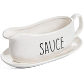LE TAUCI gravy boat with saucer stand for neat sauces and dressings.