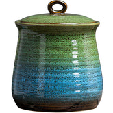 LGQ 40oz cookie jar with lid keeps treats fresh on the counter.