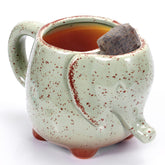 LIAVOEIZ tea mug with elephant green glaze for comfortable daily sipping.