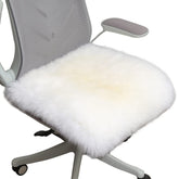 LLB sheepskin chair cushion 18x18 in ivory adds plush comfort to any chair.