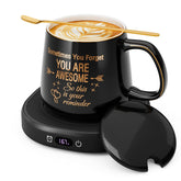LOUTYTUO coffee mug warmer on a desk keeps drinks at the perfect temperature.