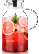 Luna Manta glass pitcher lid and spout for easy pouring with adjustable openings.