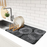 LuxStep dish drying mat demonstrates absorption, keeping countertops dry after washing.