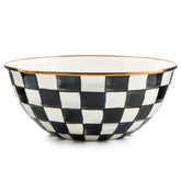 Mackenzie-Childs enamel everyday bowl on table with Courtly Check for stylish entertaining