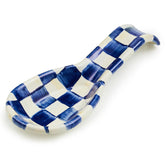 MacKenzie-Childs enamel spoon rest on counter showcases blue-check design and keeps surfaces tidy.