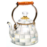 MACKENZIE-CHILDS enamel tea kettle in grey-and-white Sterling Check for stylish stovetop brewing.