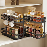 Magheo pull-out spice rack in cabinet shows two-tier design for easy access.