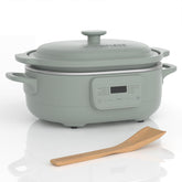 Magnifique 4-quart slow cooker in olive color, front view, ideal for family meals